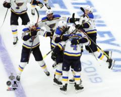 The St. Louis Blues celeberate their overtime win Game 2 of the 2019 Stanley Cup - Top Loaded 8x10 Photo